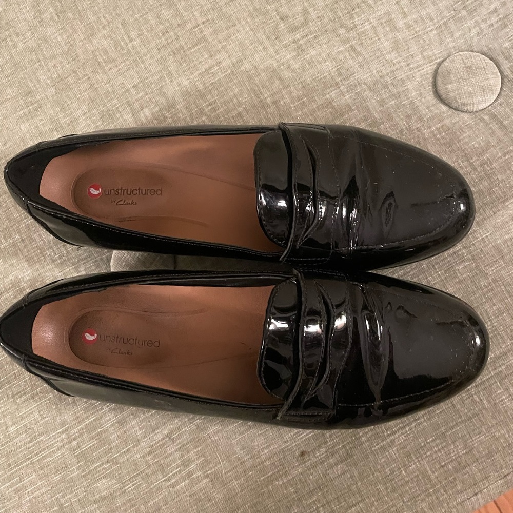 Clark’s patent black loafers